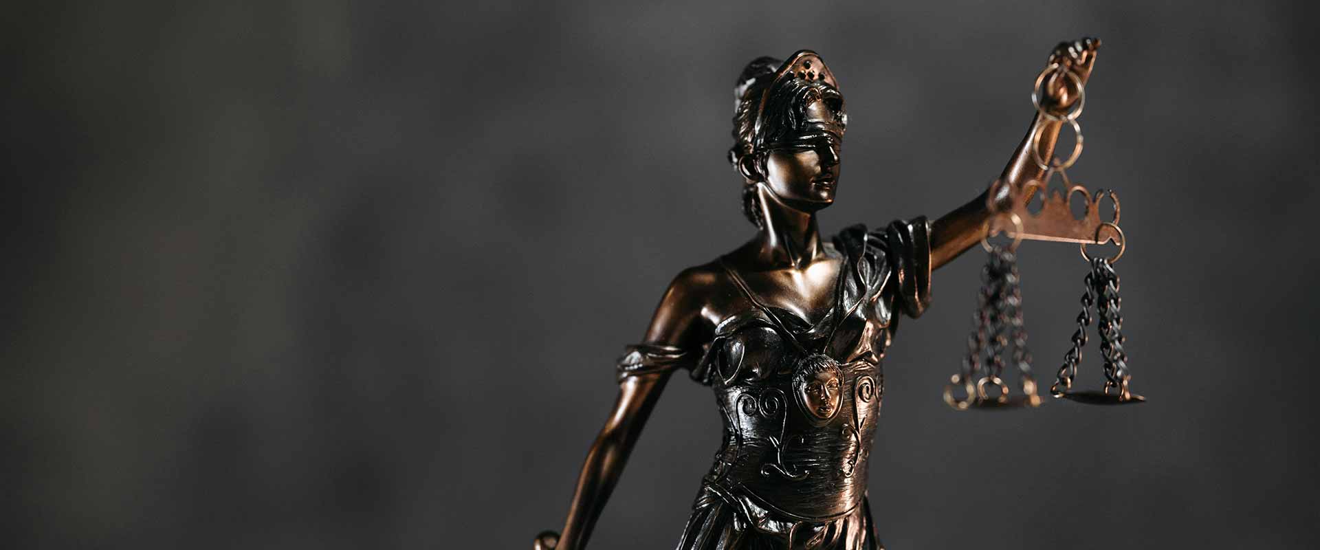 Lady Justice statue on the table