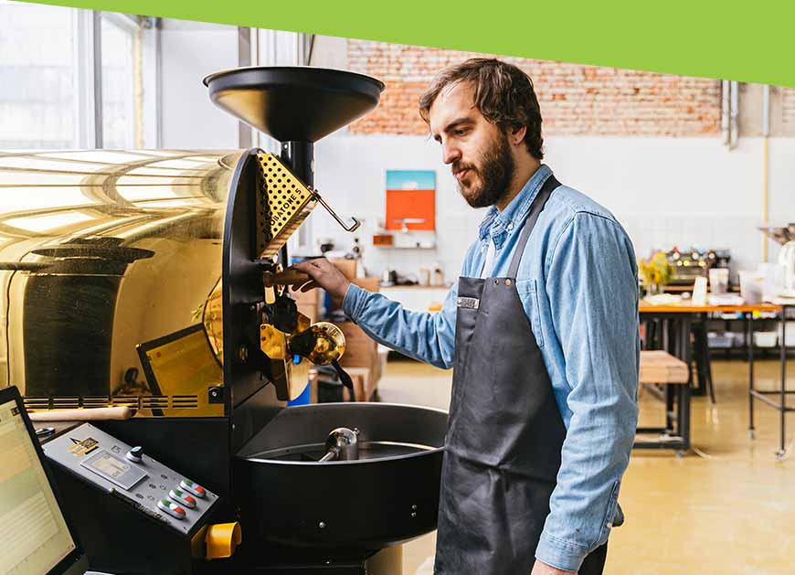 business owner working with food machine