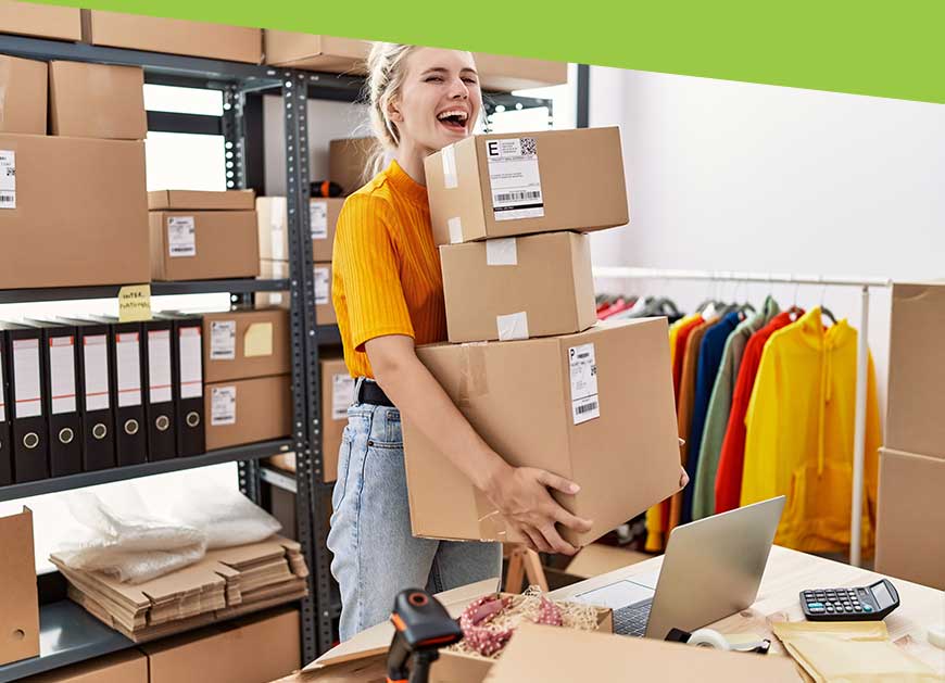 Woman caring boxes from her small business