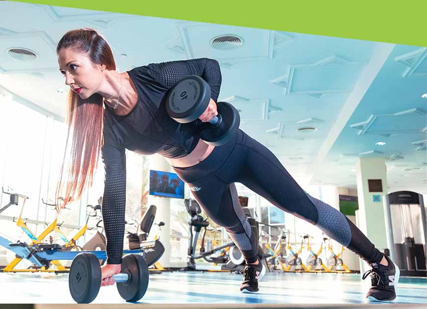 Woman Doing Exercise in the Gym